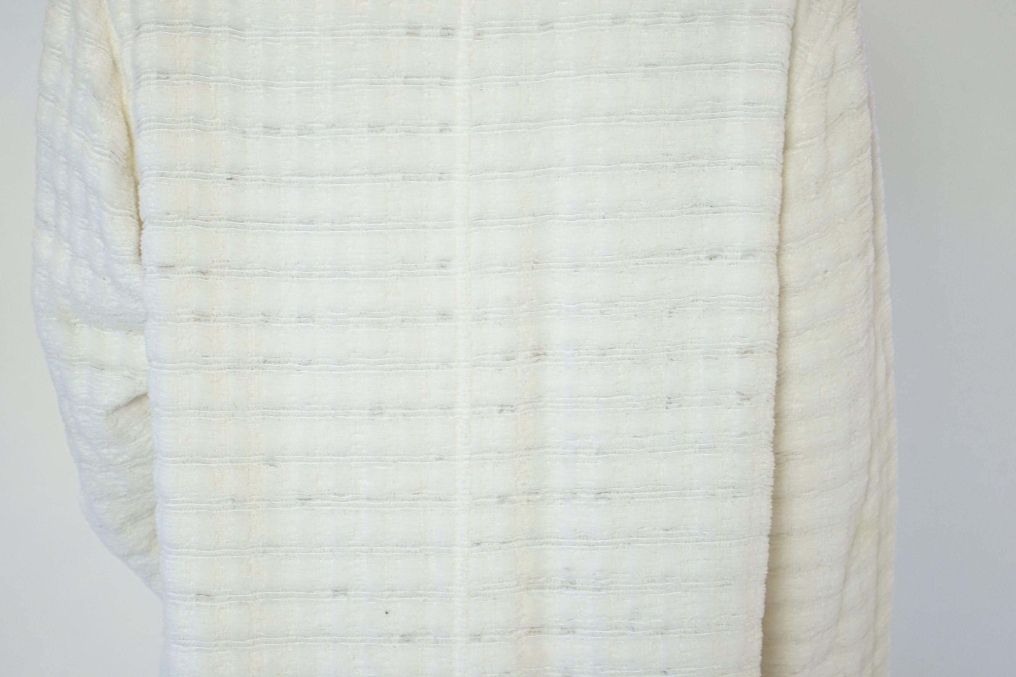 A Chanel early 1990's cream boutique jacket, size 40